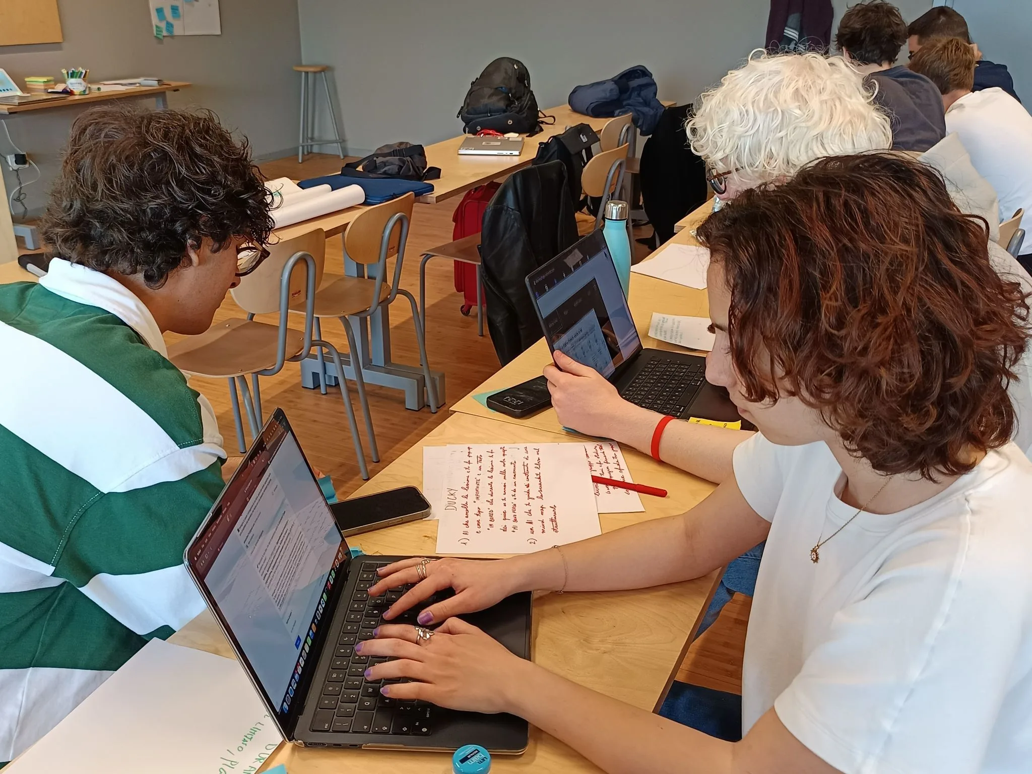 Students working through the exercises